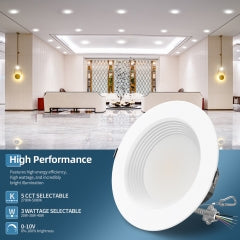 Commercial recessed LED downlight with selectable settings in an interior