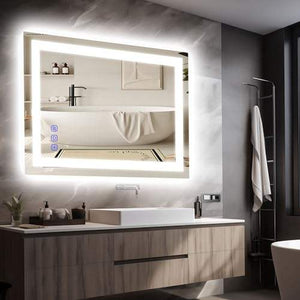 Front-lit rectangular LED bathroom mirror mounted horizontally above a bathroom vanity