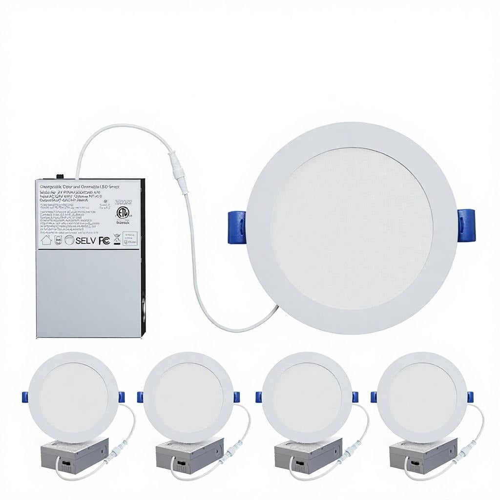 White round canless LED recessed lights with separate driver junction boxes and blue spring clips
