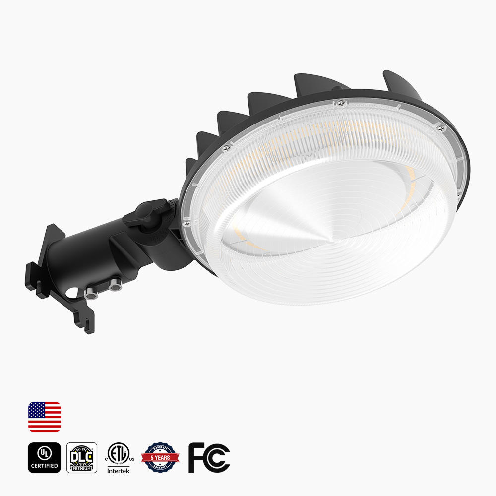 LED barn light with a round ribbed lens and mounting bracket, angled front view