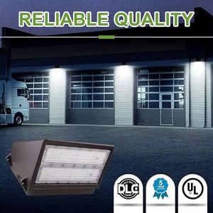 Full cutoff LED wall pack installed above commercial garage doors